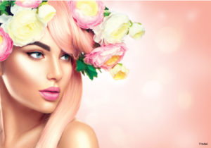 Airbrushed woman with pink hair and white and pink flowers